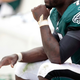 Image for article titled Should Michael Vick Stop Protecting The Ball And Start Protecting Himself?